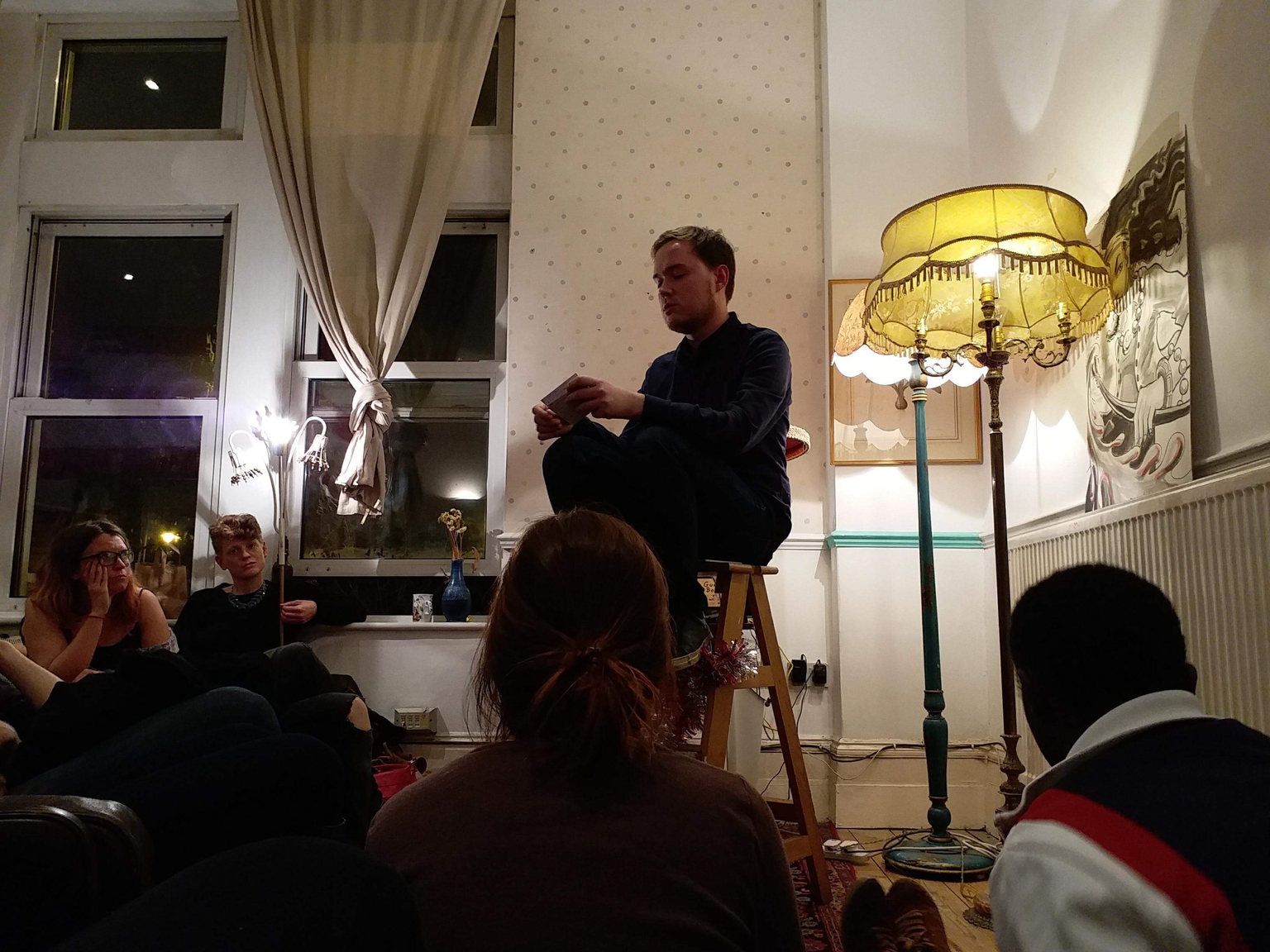 Simeon sitting and talking